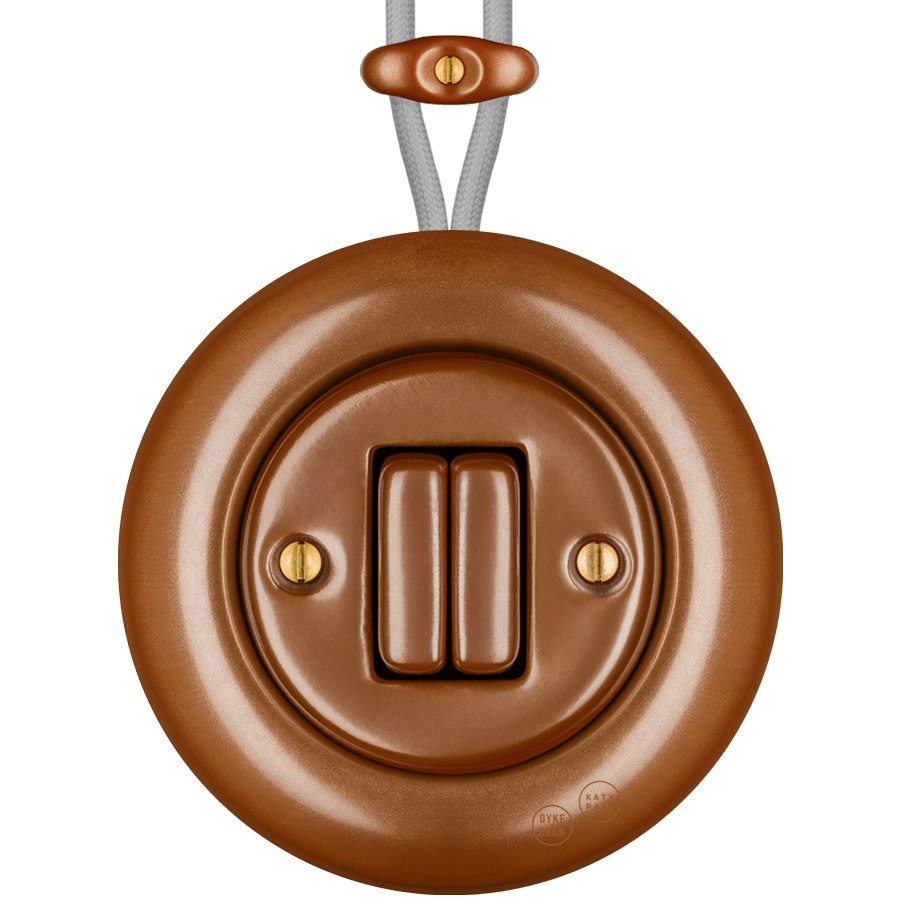 PORCELAIN KATY PATY COLONA ROUND SURFACE MOUNTED DOUBLE SLIM BUTTON SWITCH COPPER - DYKE & DEAN