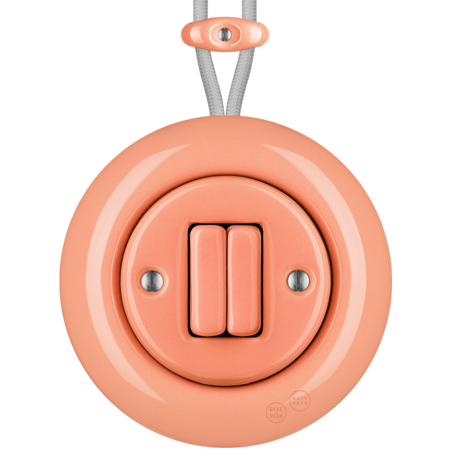 PORCELAIN KATY PATY COLONA ROUND SURFACE MOUNTED DOUBLE SLIM BUTTON SWITCH SALMON PINK - DYKE & DEAN