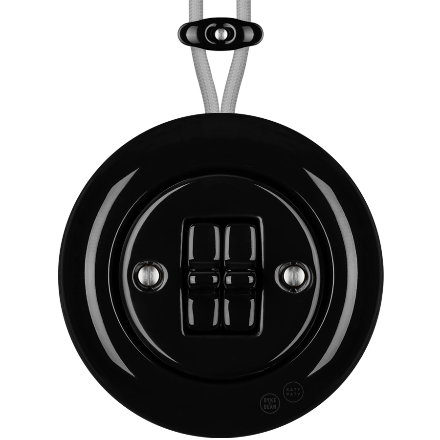 PORCELAIN KATY PATY COLONA ROUND SURFACE MOUNTED DOUBLE TOGGLE BUTTON SWITCH BLACK - DYKE & DEAN