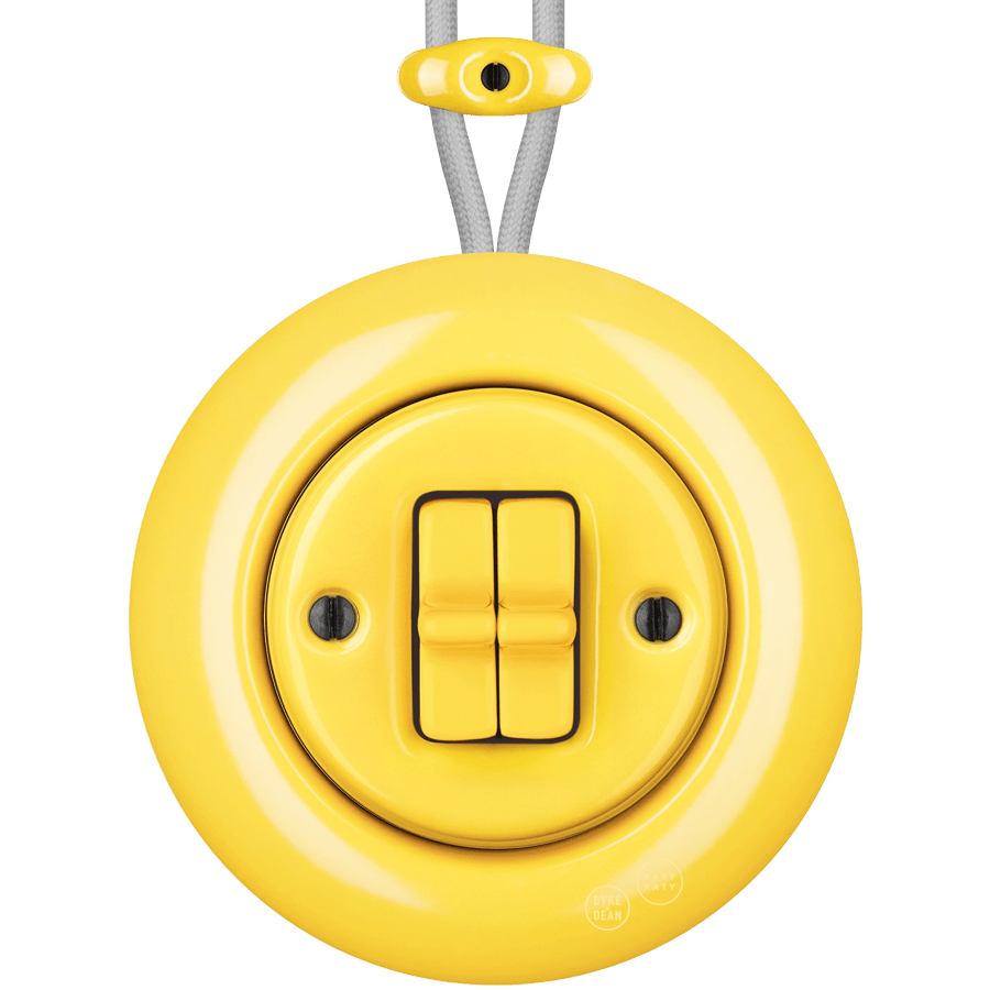 PORCELAIN KATY PATY COLONA ROUND SURFACE MOUNTED DOUBLE TOGGLE BUTTON SWITCH YELLOW - DYKE & DEAN