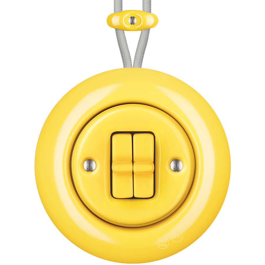 PORCELAIN KATY PATY COLONA ROUND SURFACE MOUNTED DOUBLE TOGGLE BUTTON SWITCH YELLOW - DYKE & DEAN
