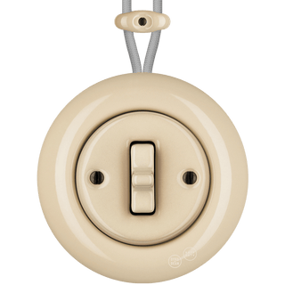 PORCELAIN KATY PATY COLONA ROUND SURFACE MOUNTED TOGGLE BUTTON SWITCH SAND - DYKE & DEAN