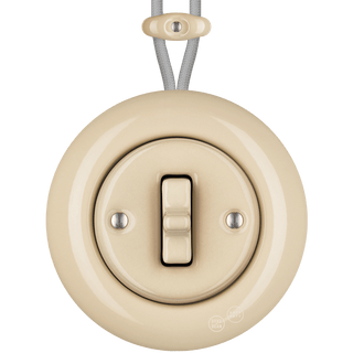 PORCELAIN KATY PATY COLONA ROUND SURFACE MOUNTED TOGGLE BUTTON SWITCH SAND - DYKE & DEAN