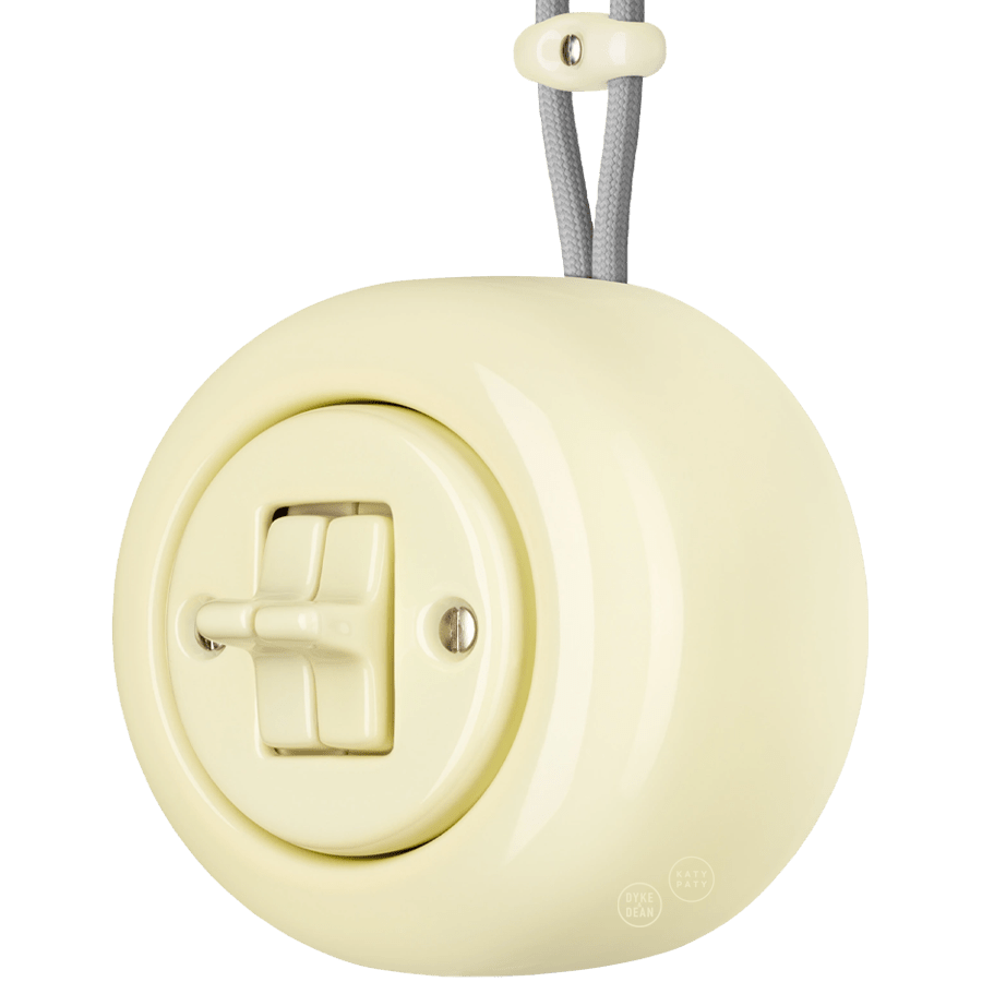PORCELAIN ROUND SURFACE MOUNTED DOUBLE TOGGLE BUTTON SWITCH VANILLA - DYKE & DEAN