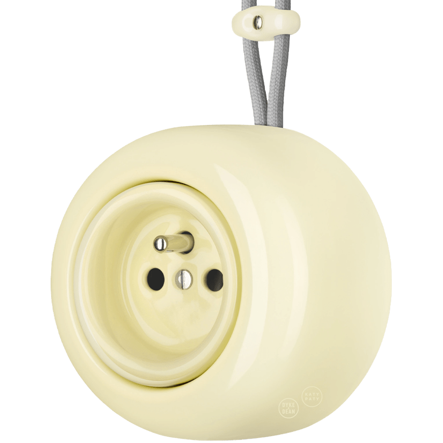 PORCELAIN ROUND SURFACE MOUNTED EURO SOCKET VANILLA - DYKE & DEAN