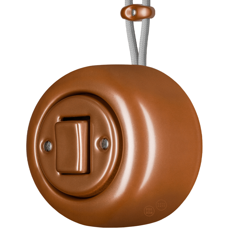 PORCELAIN ROUND SURFACE MOUNTED FAT BUTTON SWITCH COPPER - DYKE & DEAN