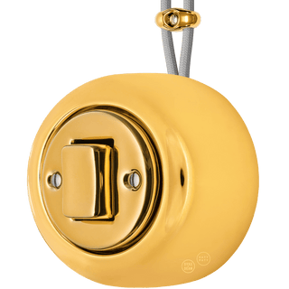 PORCELAIN ROUND SURFACE MOUNTED FAT BUTTON SWITCH GOLD - DYKE & DEAN