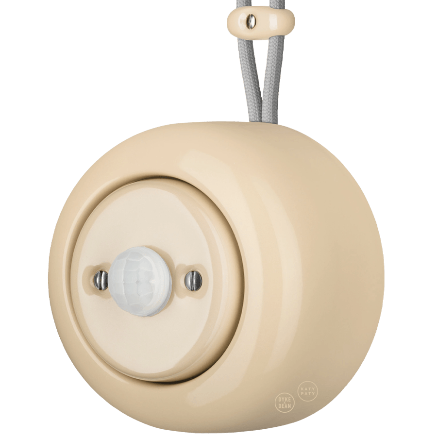 PORCELAIN ROUND SURFACE MOUNTED MOTION SENSOR SAND - DYKE & DEAN