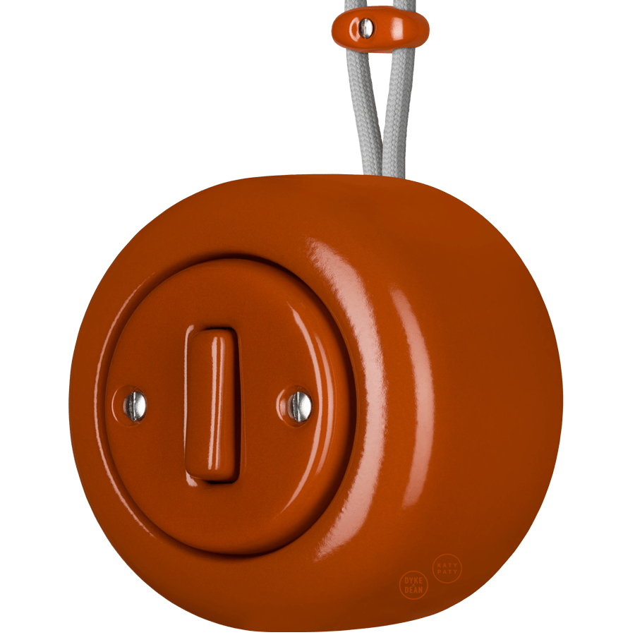 PORCELAIN ROUND SURFACE MOUNTED SLIM BUTTON SWITCH BRICK RED - DYKE & DEAN