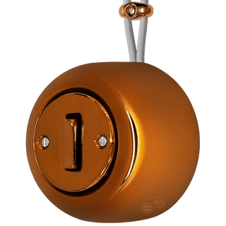 PORCELAIN ROUND SURFACE MOUNTED SLIM BUTTON SWITCH BRONZE - DYKE & DEAN