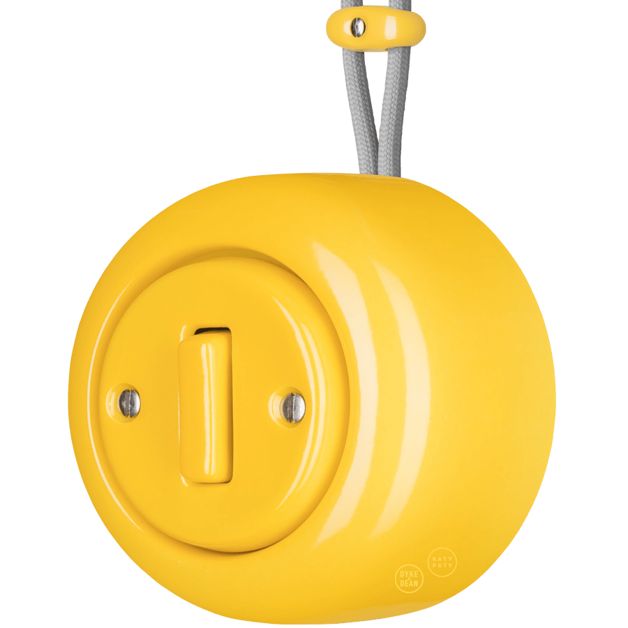PORCELAIN ROUND SURFACE MOUNTED SLIM BUTTON SWITCH YELLOW - DYKE & DEAN