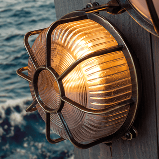 ROUND CAGED BRASS BULKHEAD LAMP - DYKE & DEAN